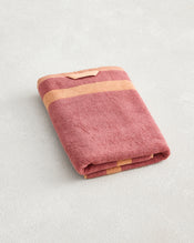 The Bed Threads Terracotta & Pink Clay Two-Toned 100% Cotton Terry Bath Towel (650GSM) features soft terry fabric and two beige stripes—ideal for anyone seeking a plush, stylish bath towel. - view